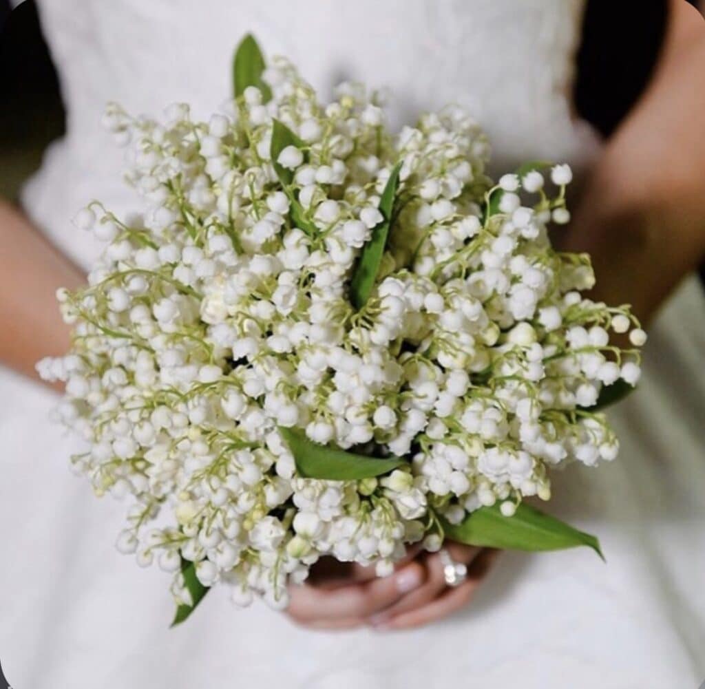 14 Wedding Flowers That Will Make Your Big Day Bloom with Beauty 10 lily of valley